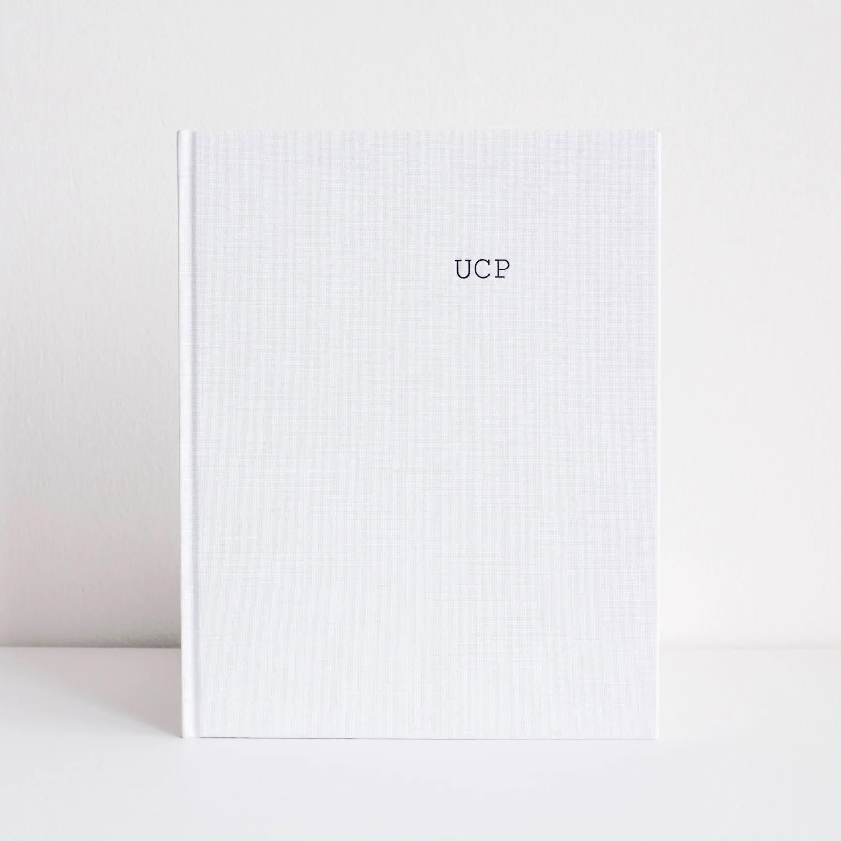 UCP-Laura-Hospes-photobook-bound-in-Brillianta-Calandré-vanheektextiles